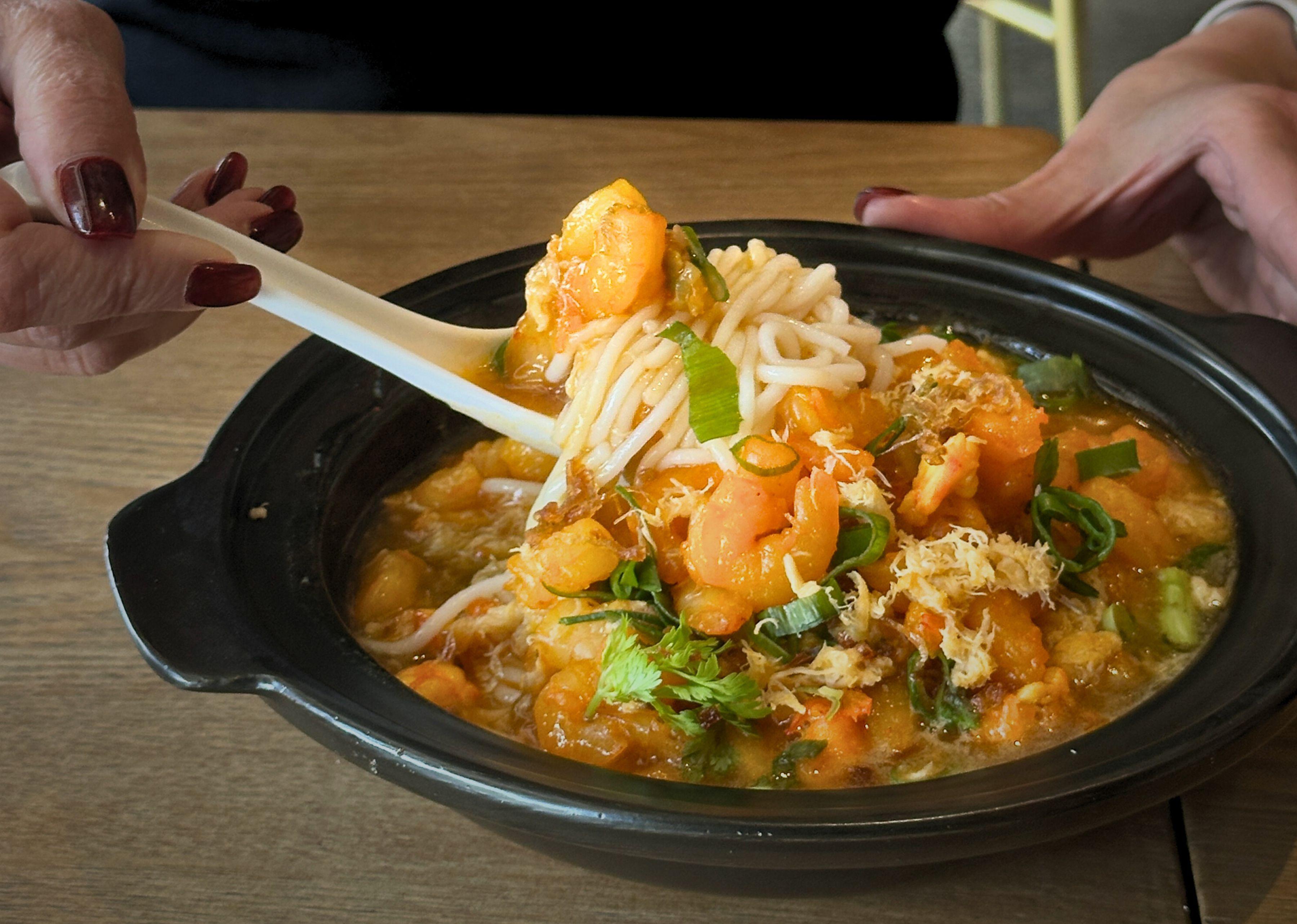 Aunty Nguyen’s Banh Canh Tom Cua (shrimp and crab noodles) action